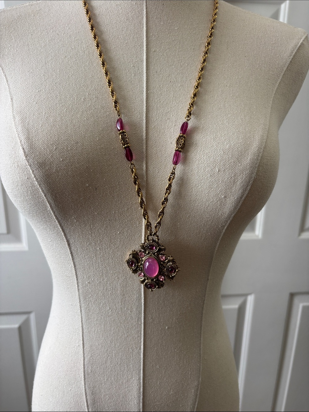 1928 Gold-Tone Necklace with Pink Cabochon Pendant and clip on earrings